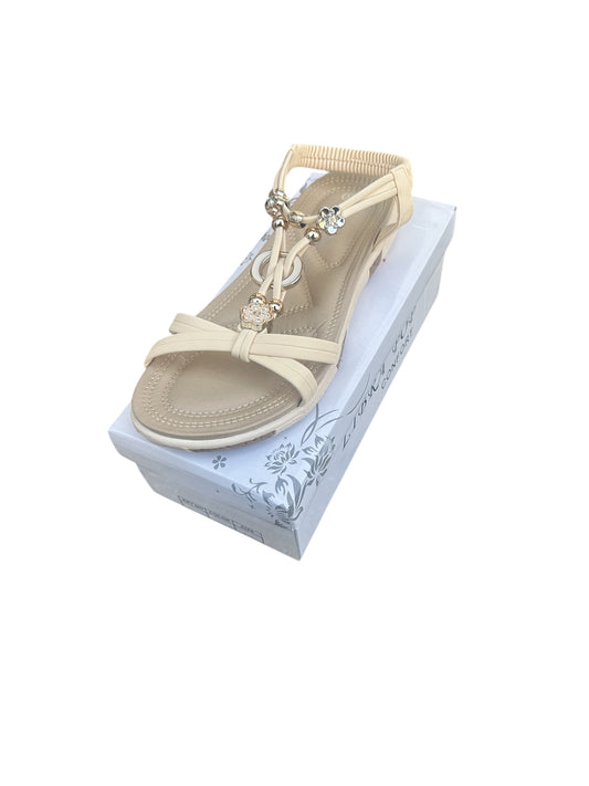 Elegante Damensandale in weiß,Beige und schwarz mit Blumenapplikationen